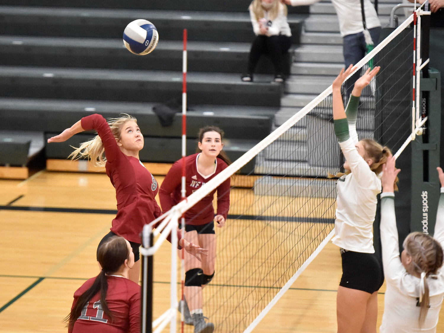 W.F. West senior Ava Olsen winds up to strike the ball against Woodland on Tuesday, Nov. 9, in Woodland.
